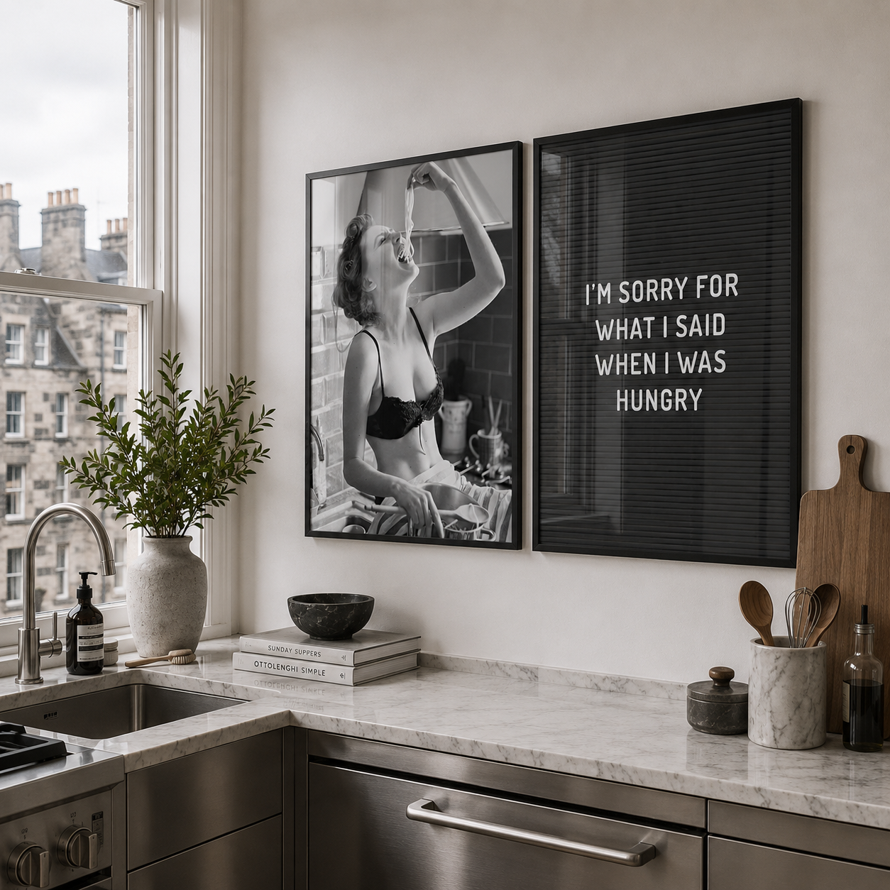 Modern kitchen with framed artwork on the wall