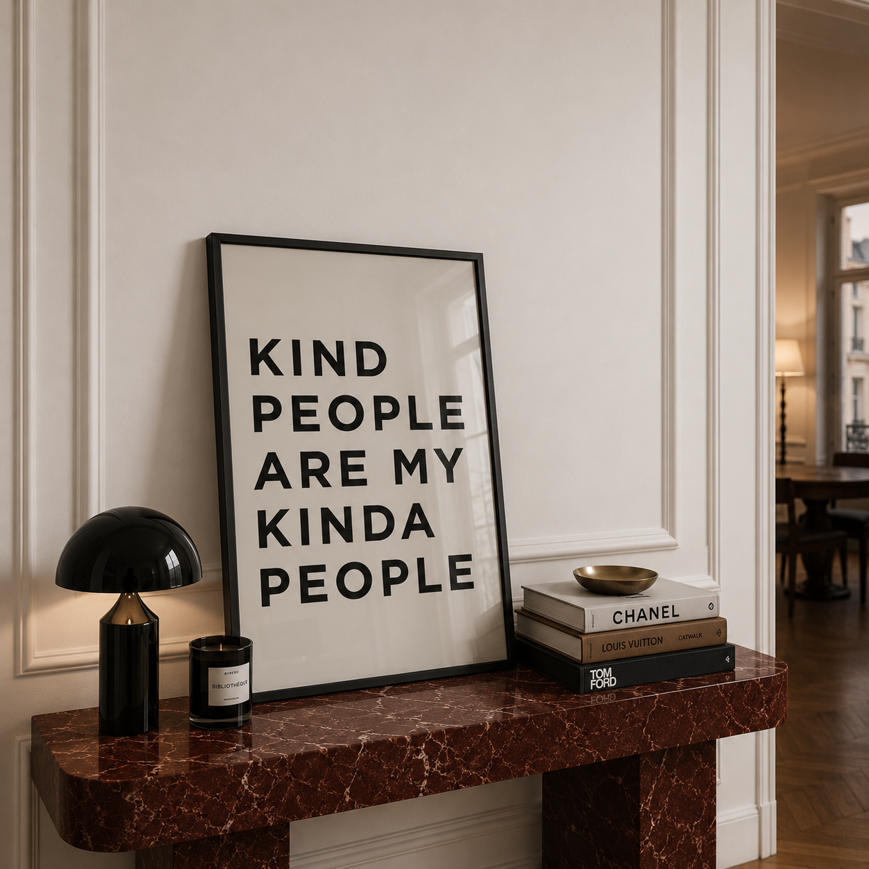 Framed poster with 'Kind people are my kinda people' text on a marble console table.