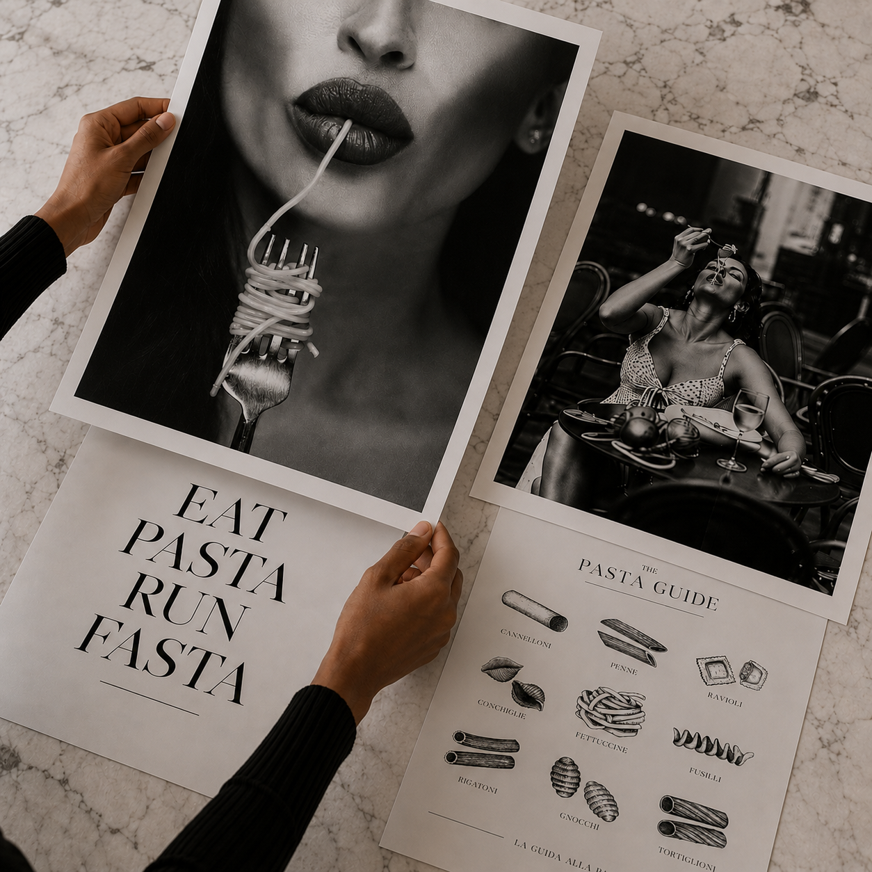 Two framed prints on a marble surface, one with text 'Eat Pasta Run Fasta' and the other showing a pasta guide.