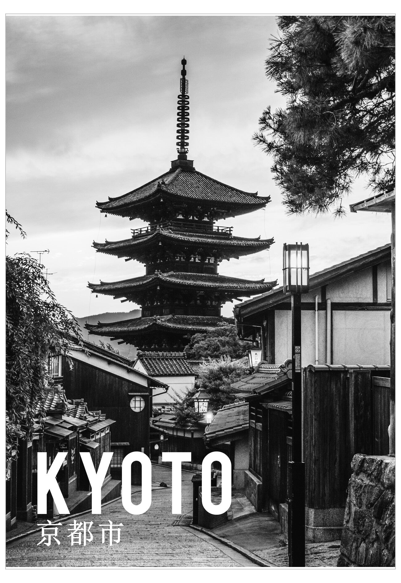 Traditional Japanese pagoda with 'KYOTO' text overlay in black and white.
