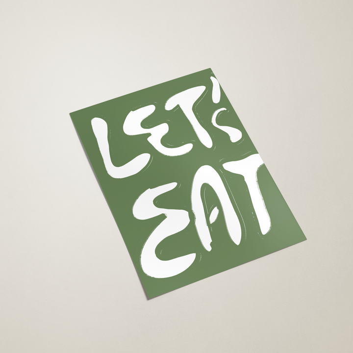 Green sign with 'LET'S EAT' text on a beige background
