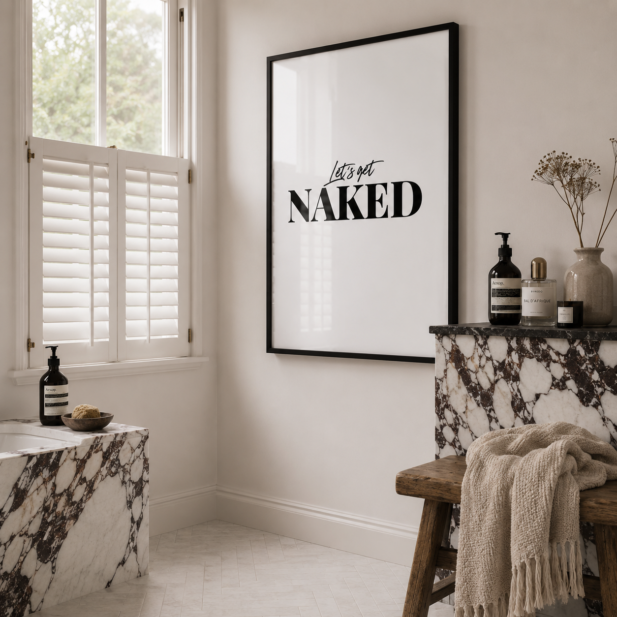 Stylish Marble Modern Bathroom with 'Let's Get Naked' poster on the wall