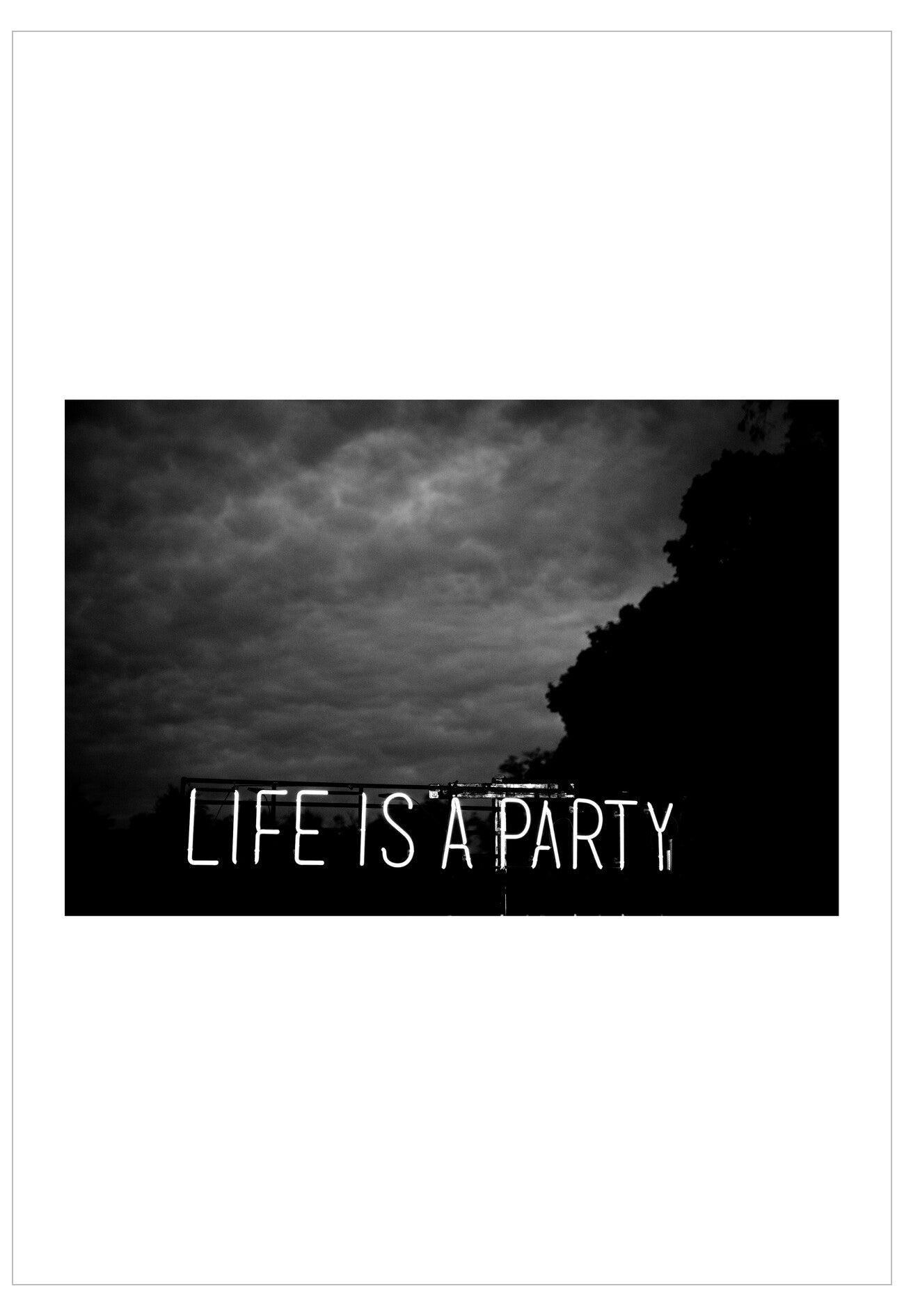 Black and white image with 'LIFE IS A PARTY' text overlay on a dark sky background.
