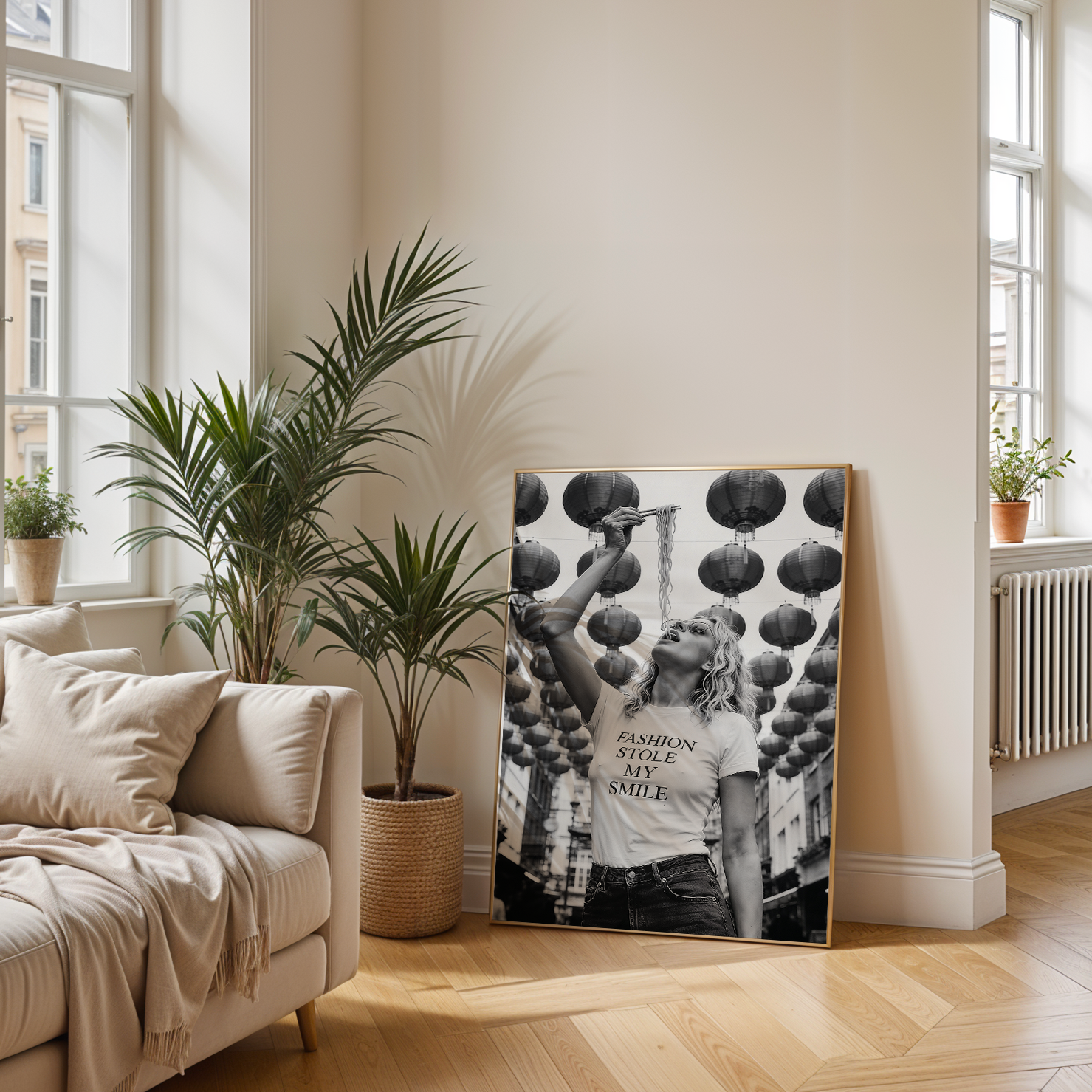 Modern living room with a sofa, plants, and a decorative wall art piece.