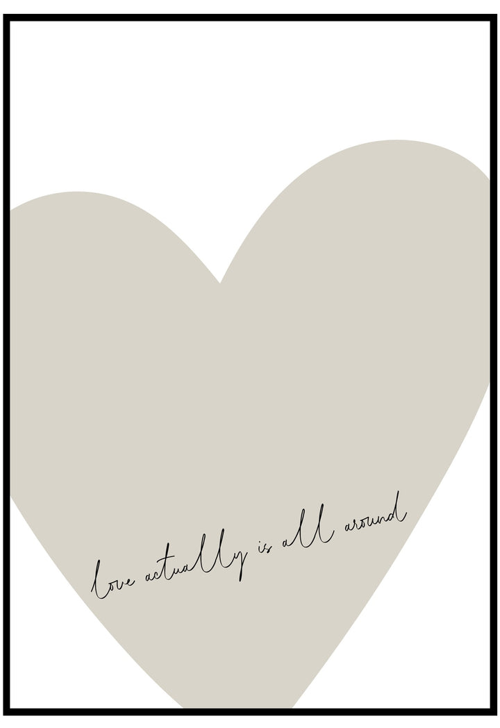 Heart-shaped poster with text 'Love actually is all around' on a white background