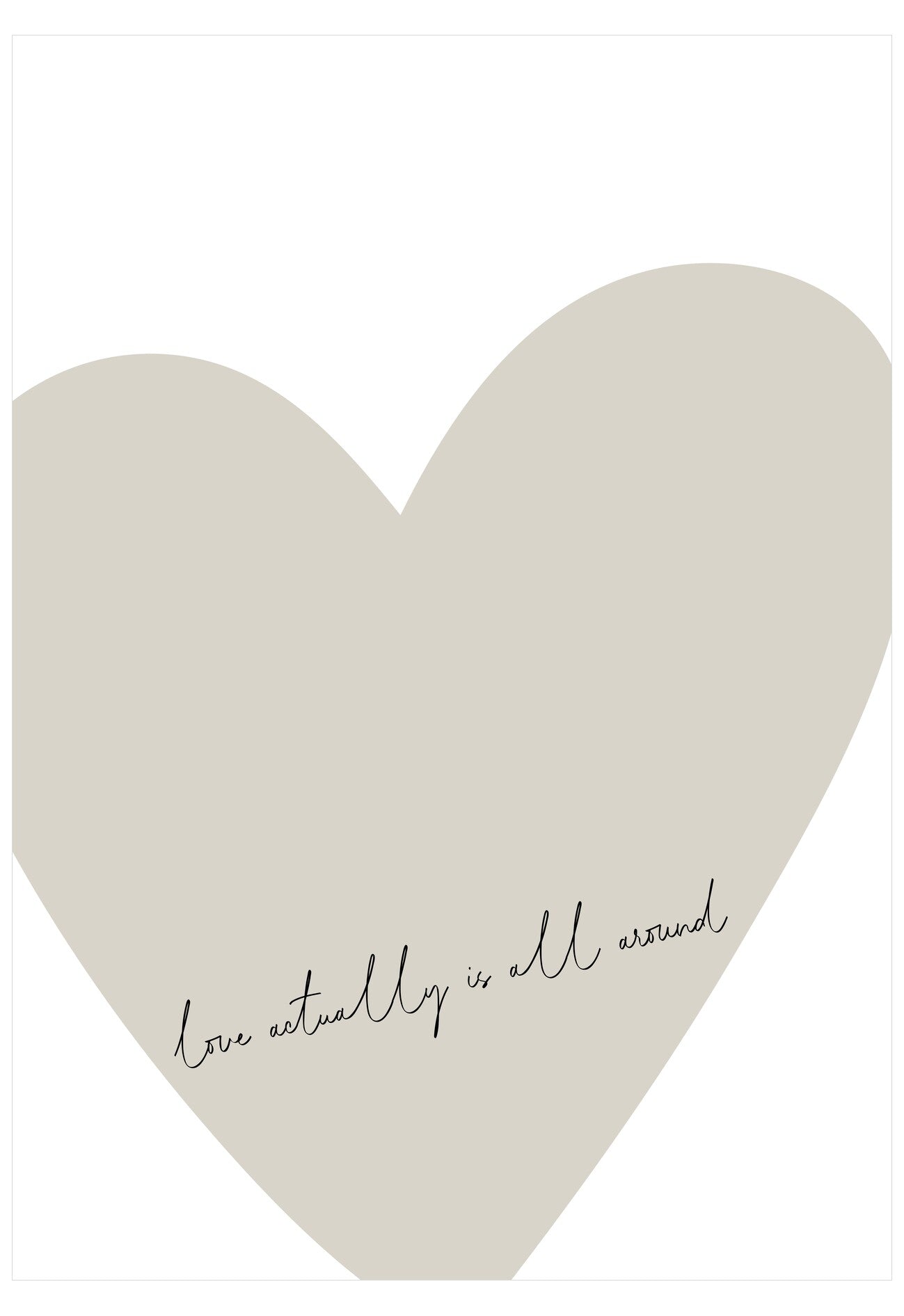 Heart-shaped beige pillow with 'love actually is all around' text on a white background