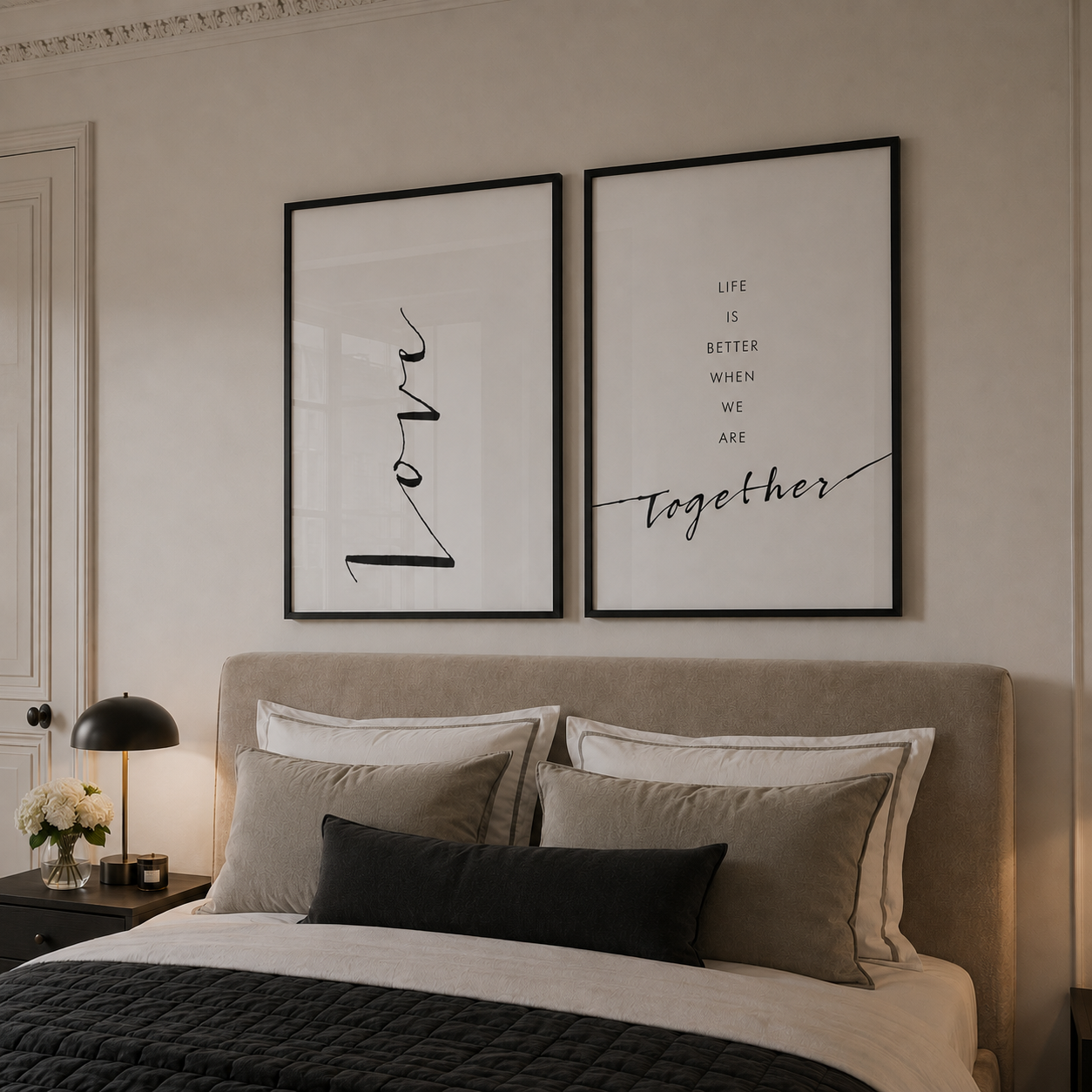 Bedroom with a bed, pillows, and framed wall art on a neutral wall.