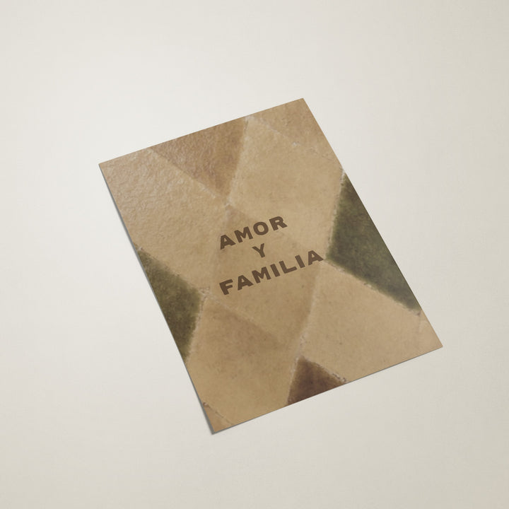 Brown paper bag with 'AMOR Y FAMILIA' text on a light gray background