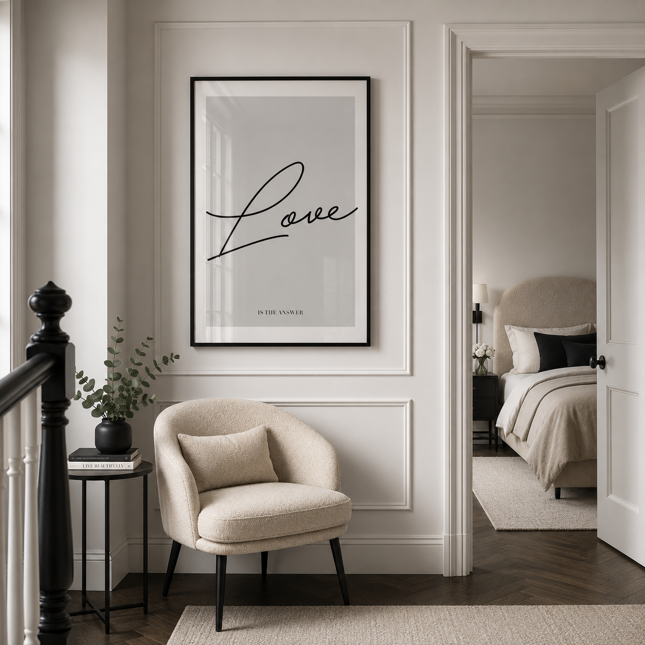 Modern interior with a chair, plant, and framed artwork on a wall.