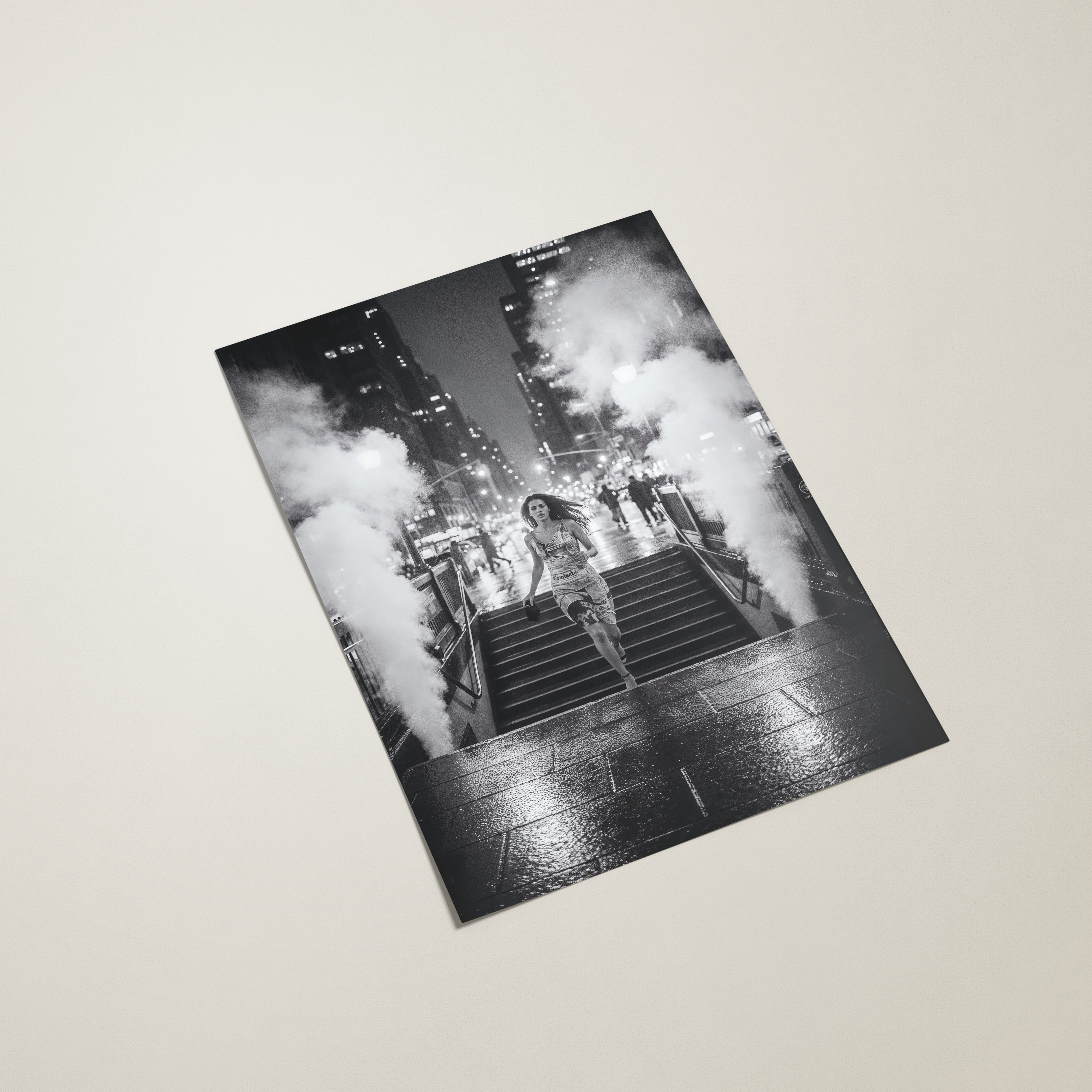 Black and white print of a woman in new york on a light beige background