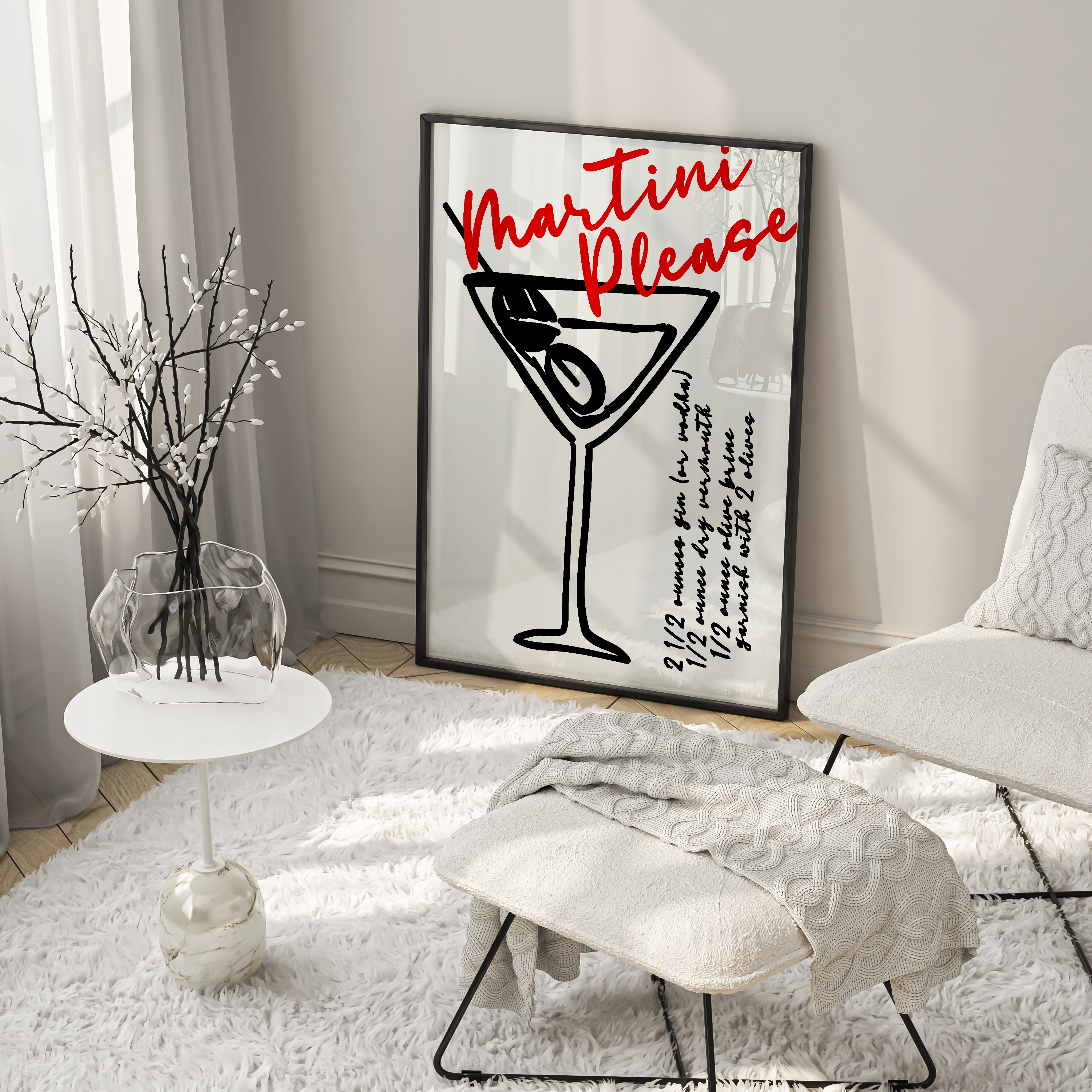 Modern living room with a white armchair, ottoman, and 'Martini Please' framed picture.