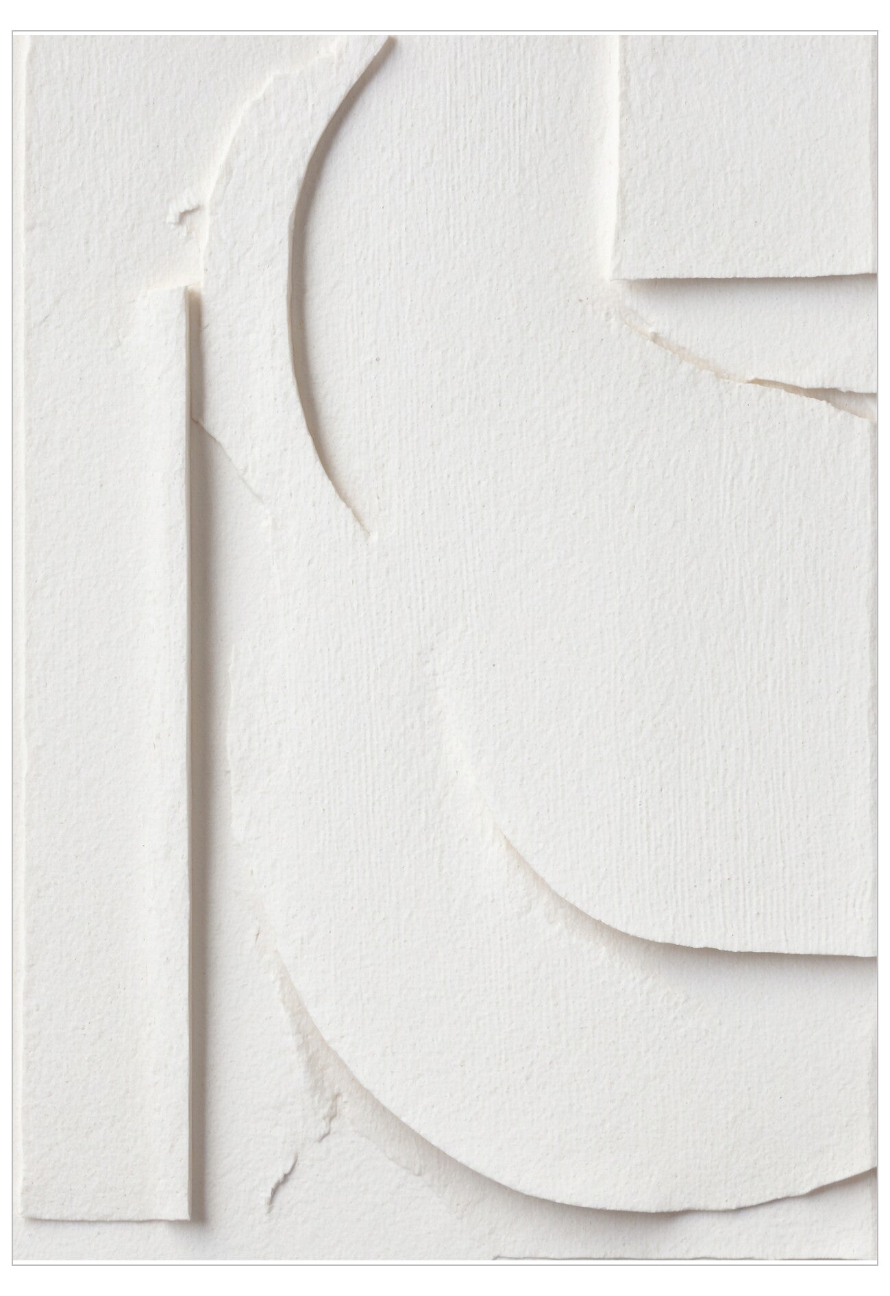 Stack of white circular paper cutouts on a light gray background