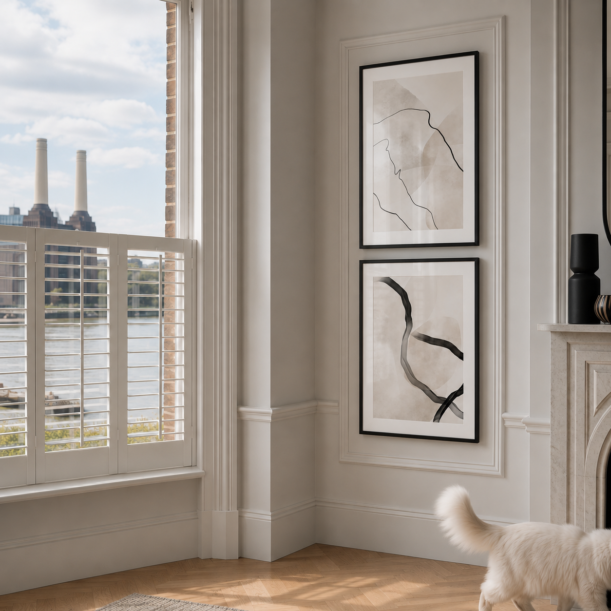 Modern living room with abstract art on the wall and a view of a river.