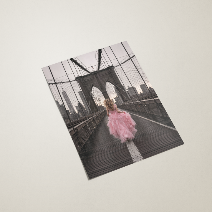 poster of a woman in a pink dress on a beige background