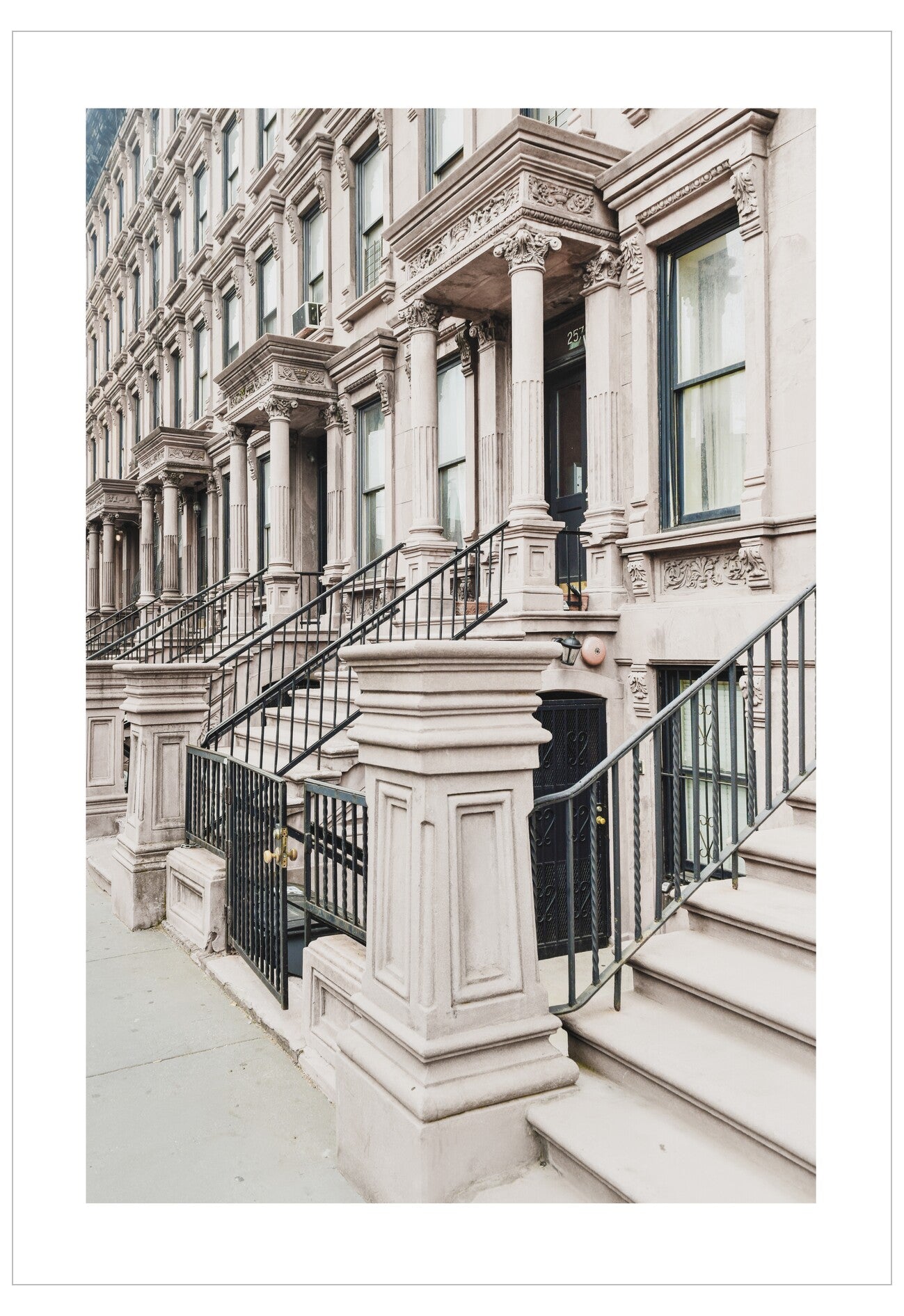 Traditional urban architecture with ornate building facades and a fire escape.