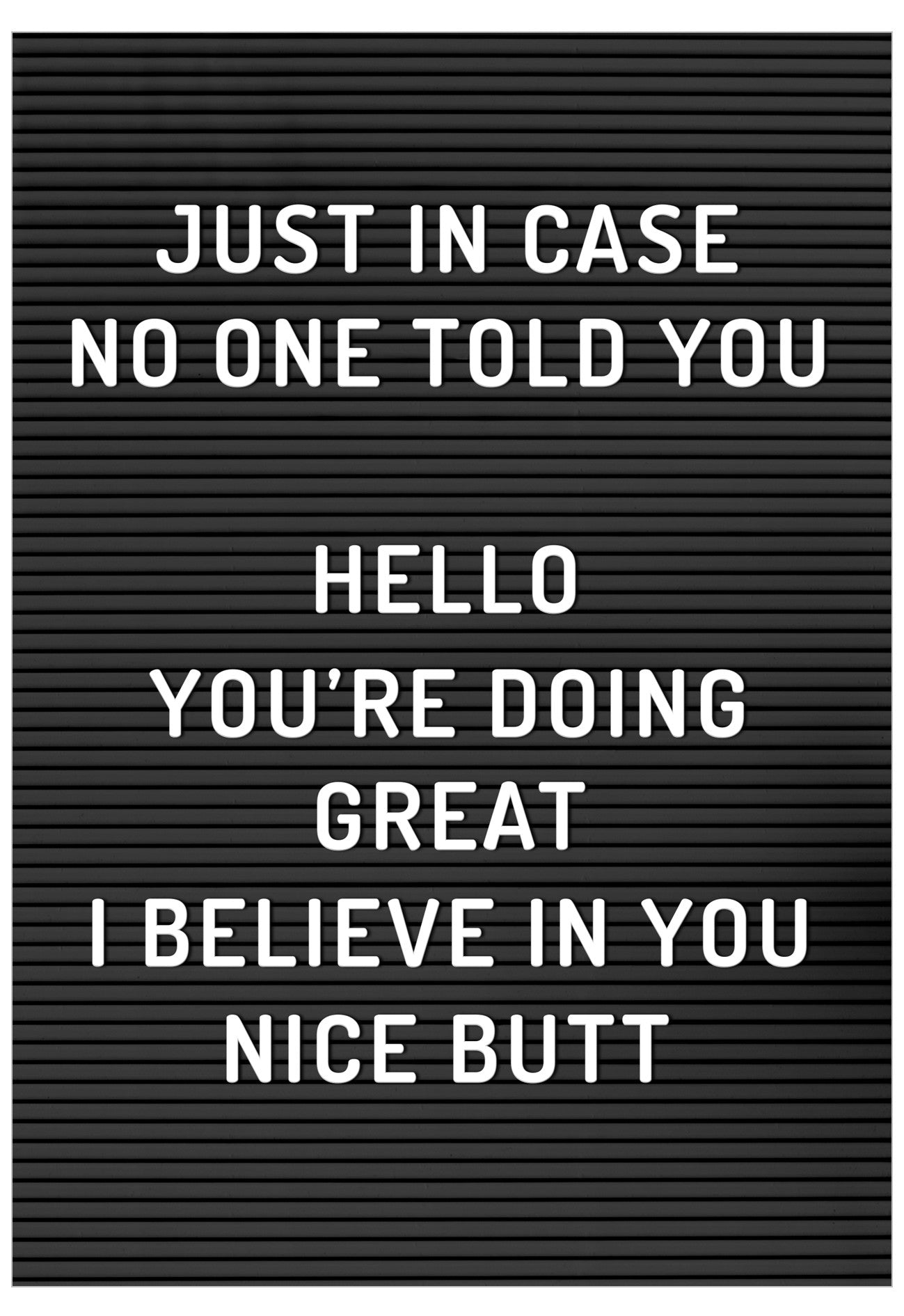 Letter board with motivational text on a black background