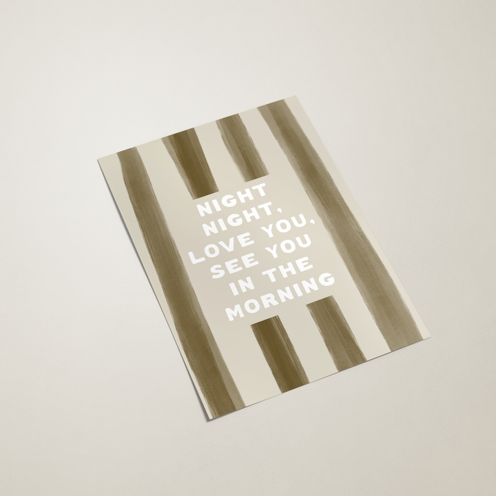 Notebook with brown and white striped cover on a beige background