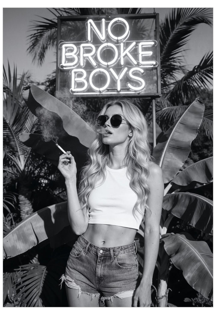 Woman in sunglasses and white top standing in front of a neon sign with palm trees in the background