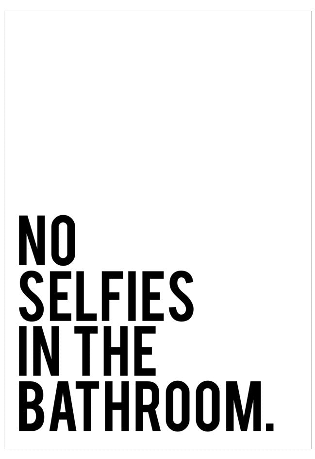 Black text on a white background with the phrase 'No selfies in the bathroom'.