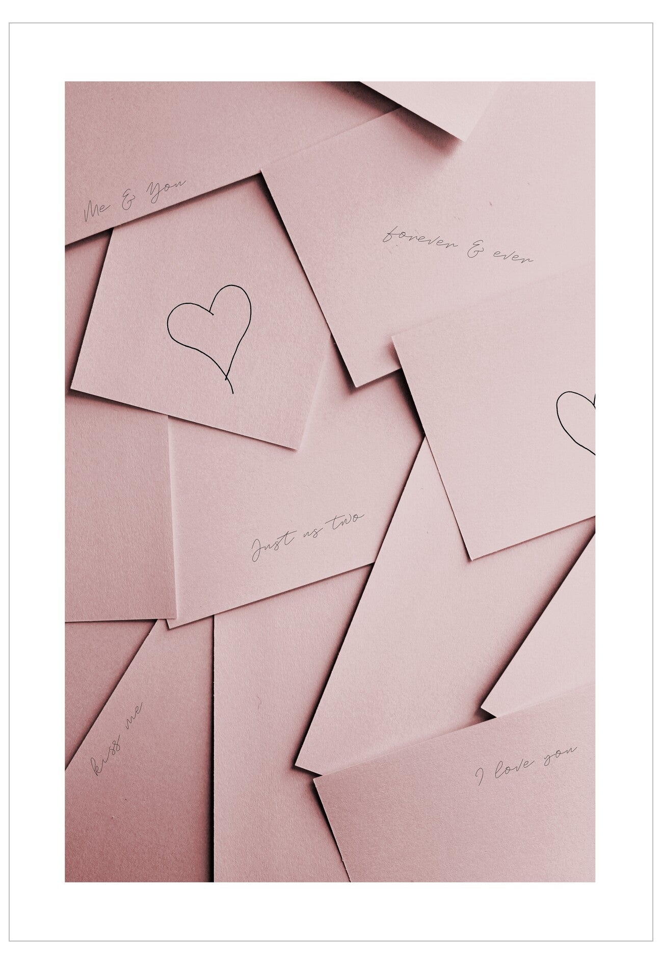 Pink cards with heart designs and text on a white background