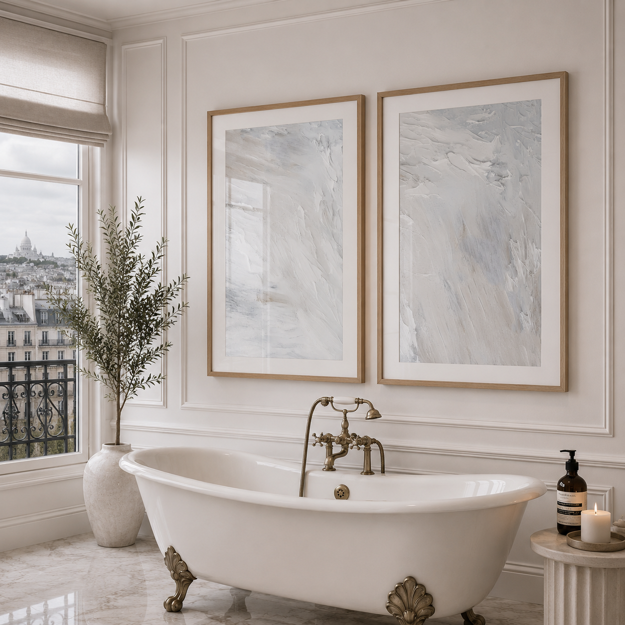 Luxurious bathroom with a freestanding bathtub, framed artwork, and decorative elements.