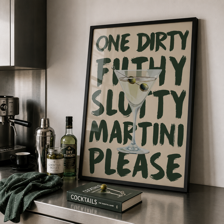 Framed poster with a cocktail graphic and text in a kitchen setting