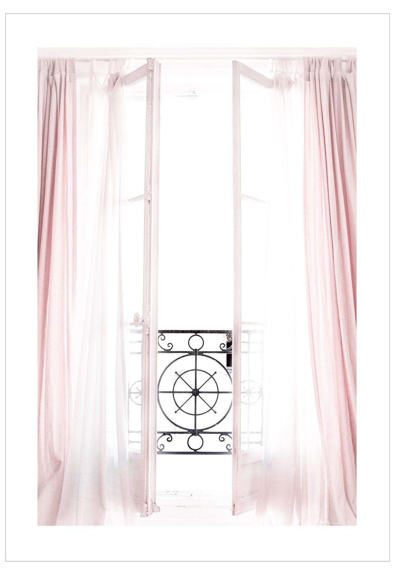 Pink curtains with a decorative metal balcony outside.