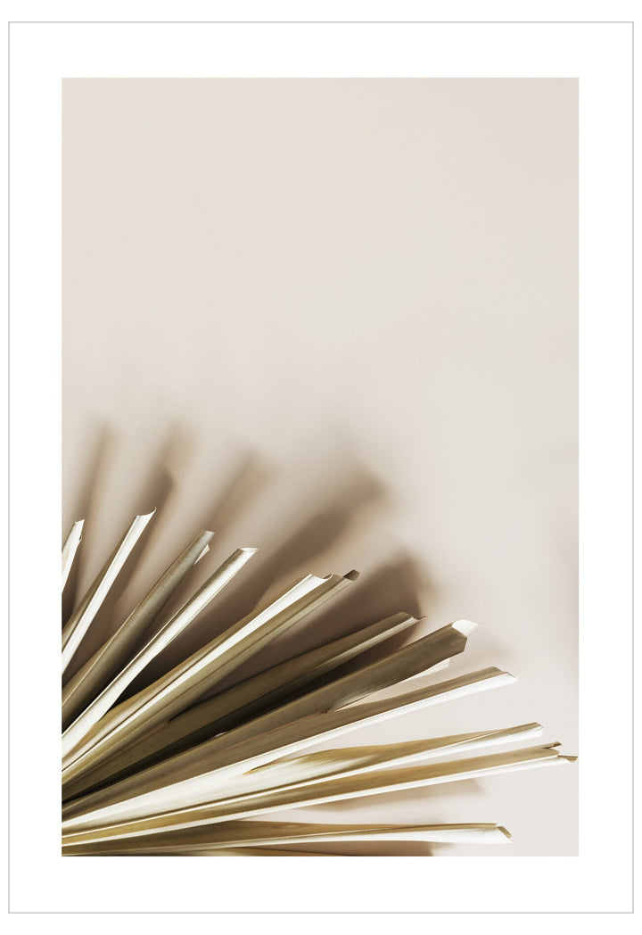 Abstract art with gold geometric shapes on a beige background