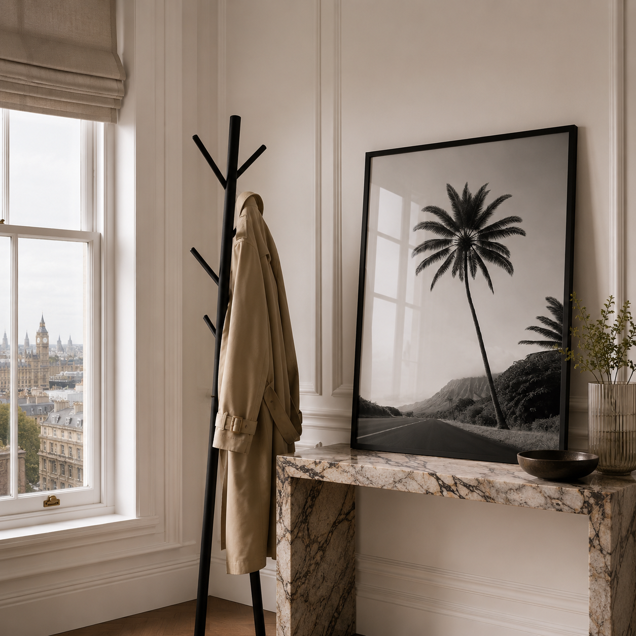 Room interior with coat rack, framed palm tree print, and window view.