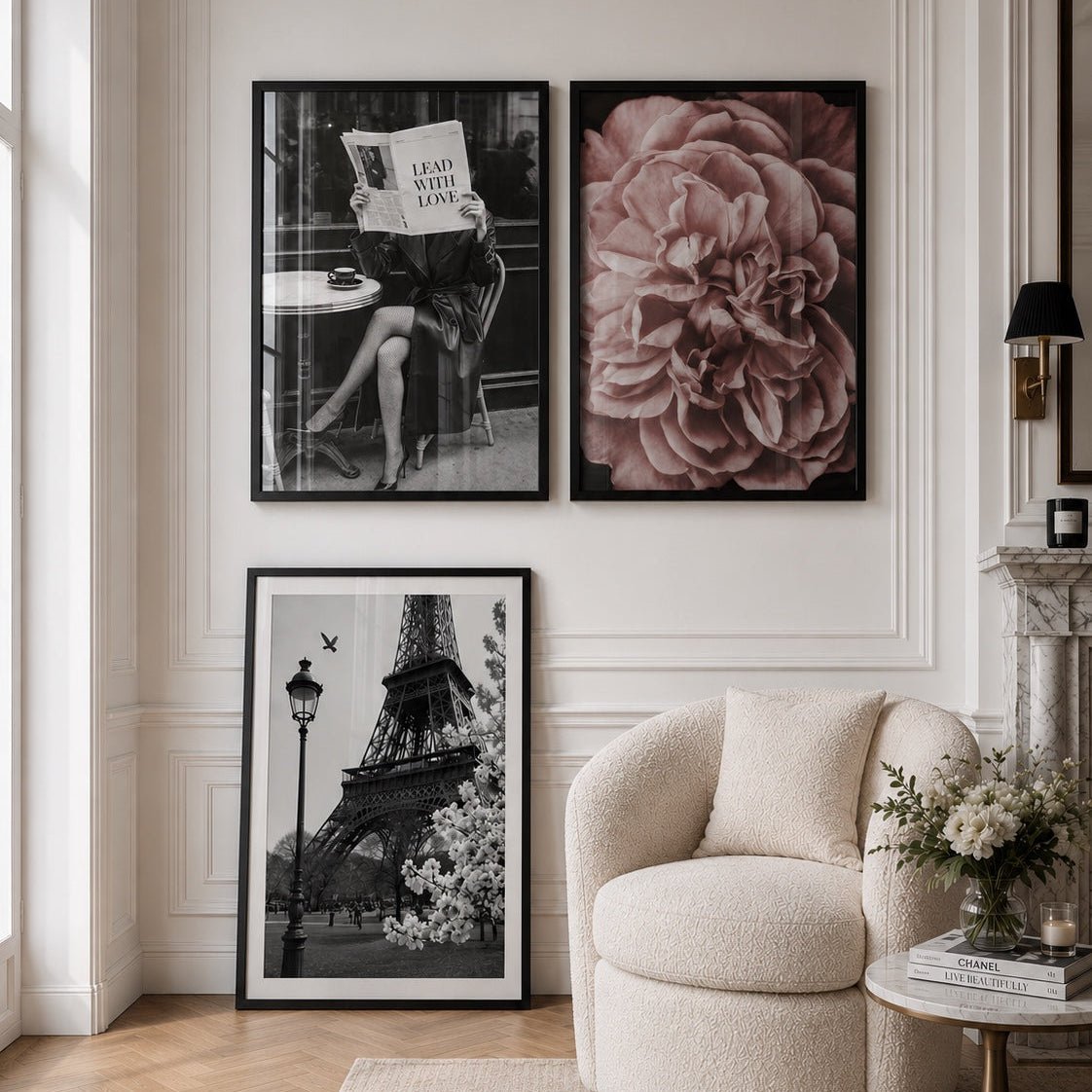Living room with framed artwork on the wall and a beige armchair.