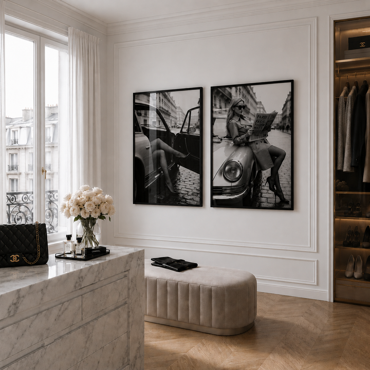 Modern interior with marble counter, black and white wall art, and stylish decor.