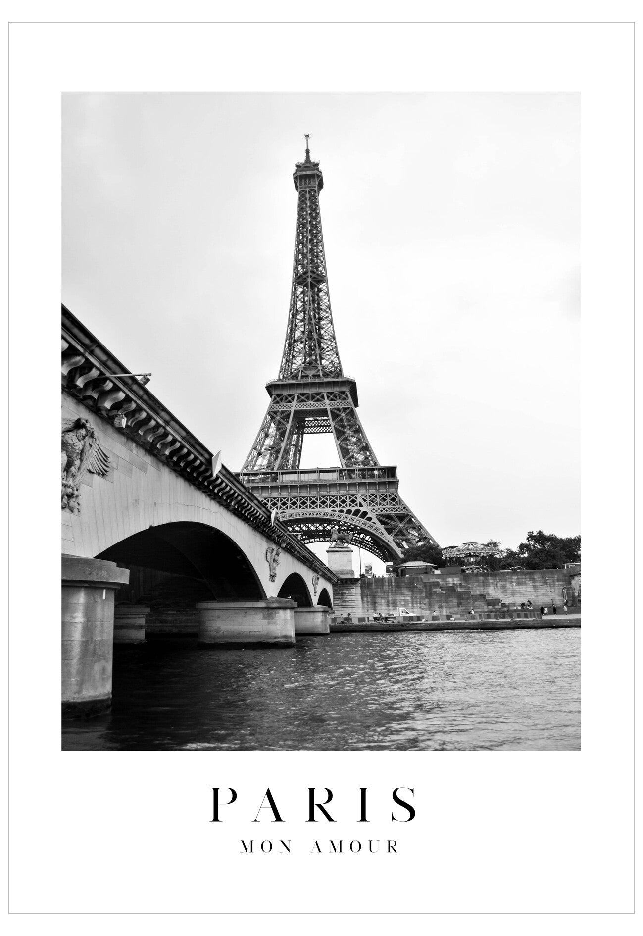 Black and white photo of the Eiffel Tower with a bridge and river below, text 'PARIS MON AMOUR' at the bottom.