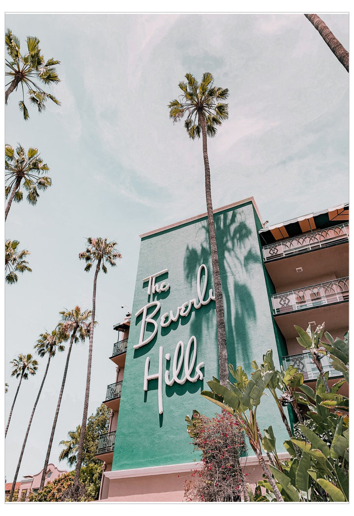 The Beverly Hills sign with palm trees in the background