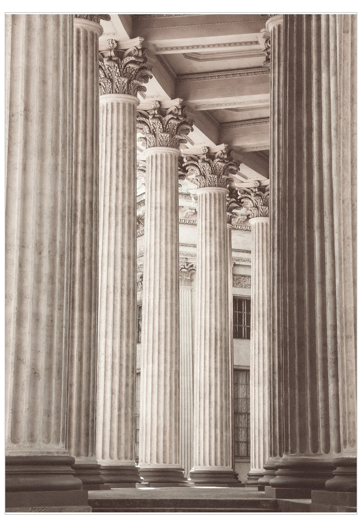 Architectural photo of classical columns with intricate details