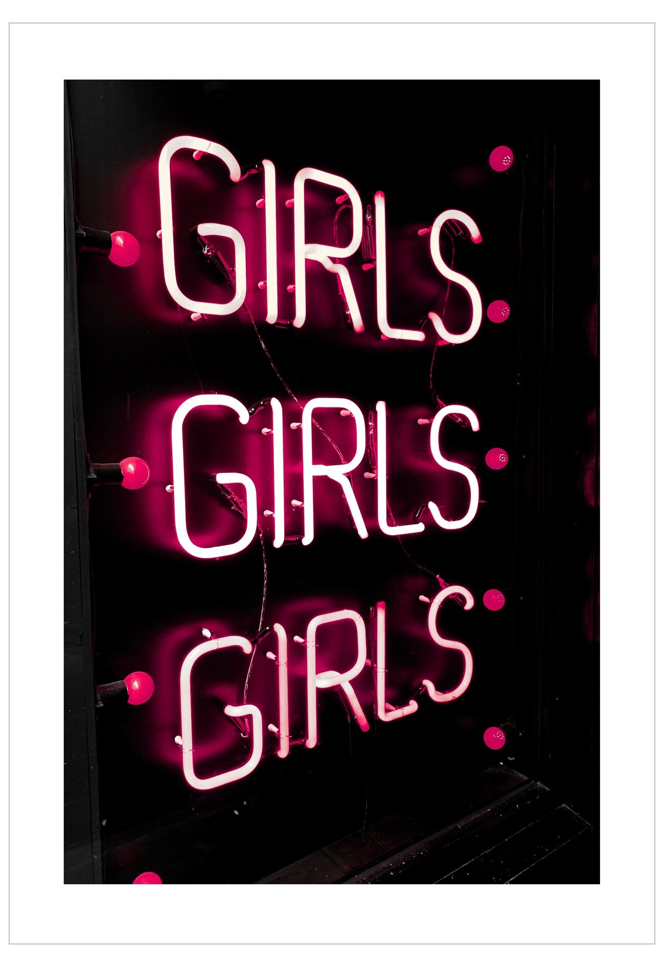 Neon sign with 'GIRLS GIRLS GIRLS' text on a black background