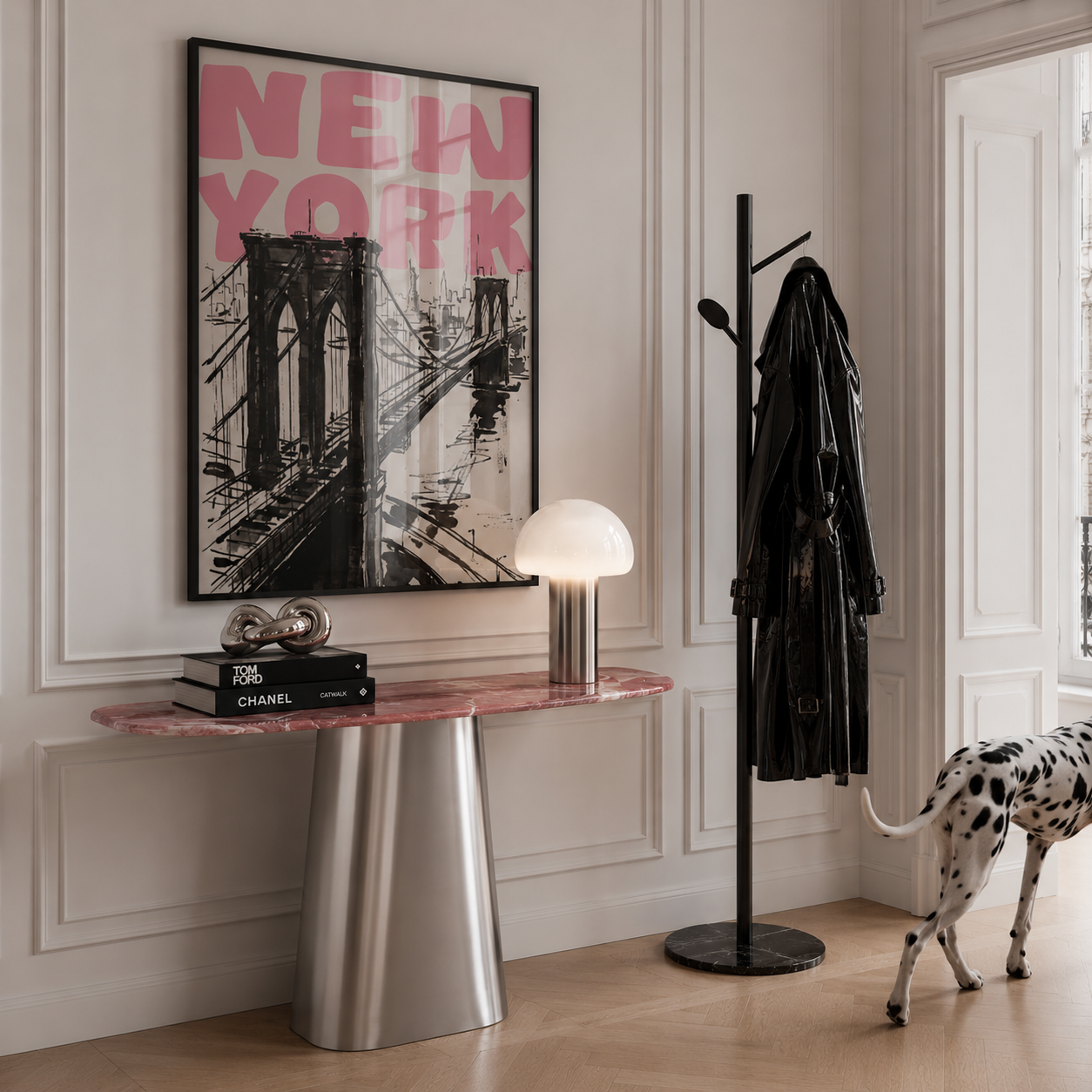 Modern interior with a stainless steel and pink marble console table, coat rack, and 'New York' artwork.