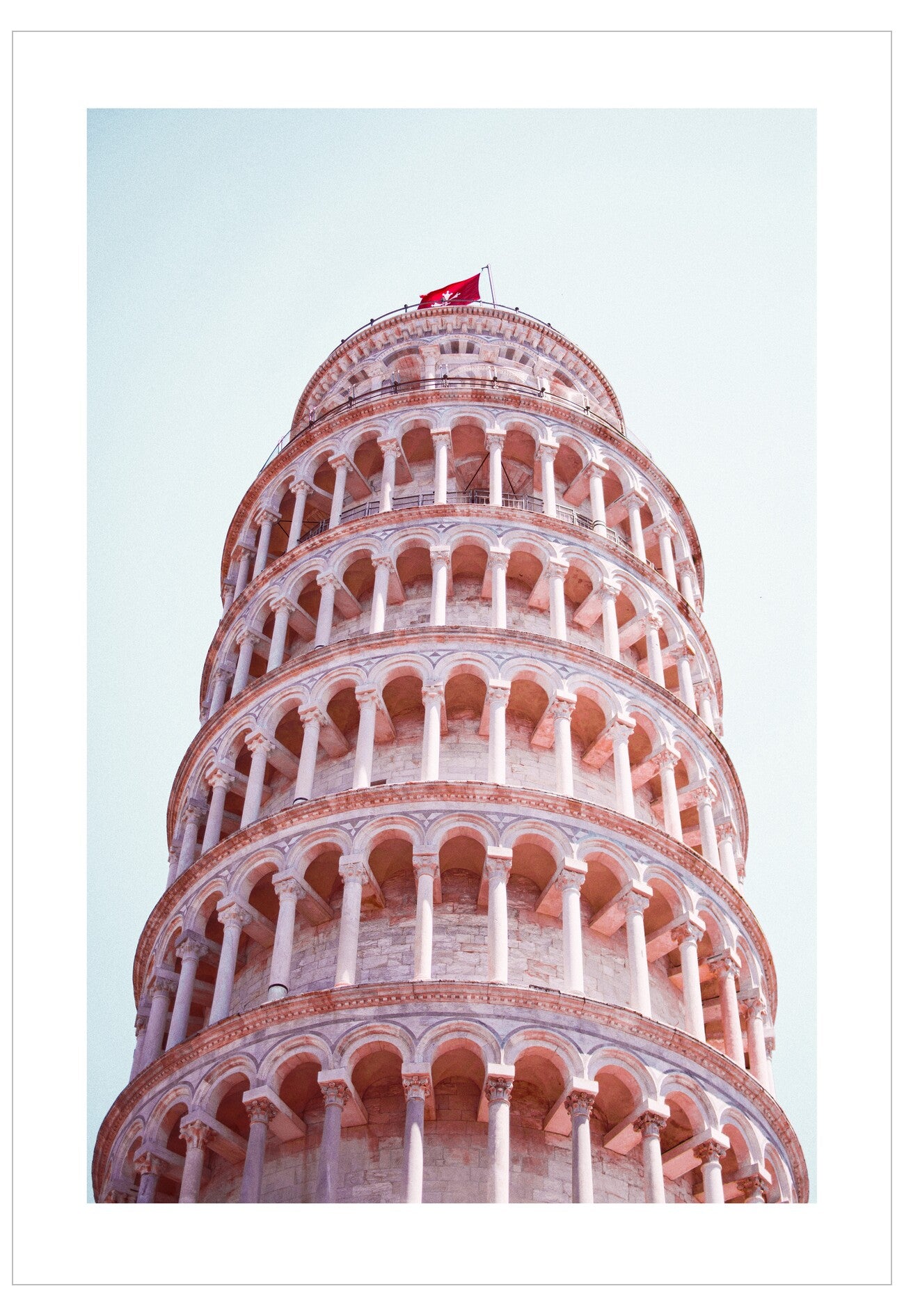 Leaning Tower of Pisa against a light blue sky
