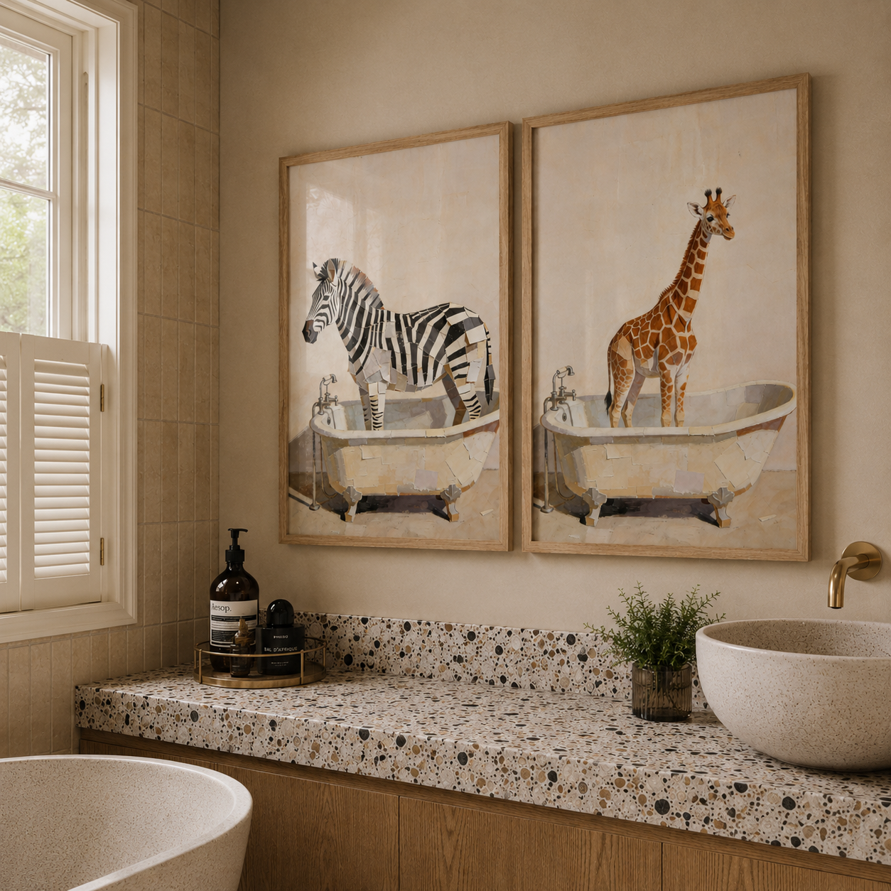 Bathroom with zebra and giraffe artwork above a sink