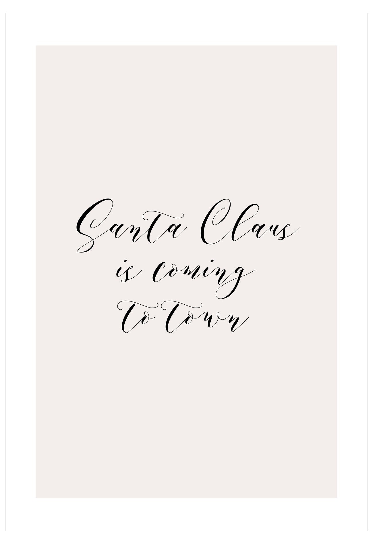 Text 'Santa Claus is coming to town' on a white background