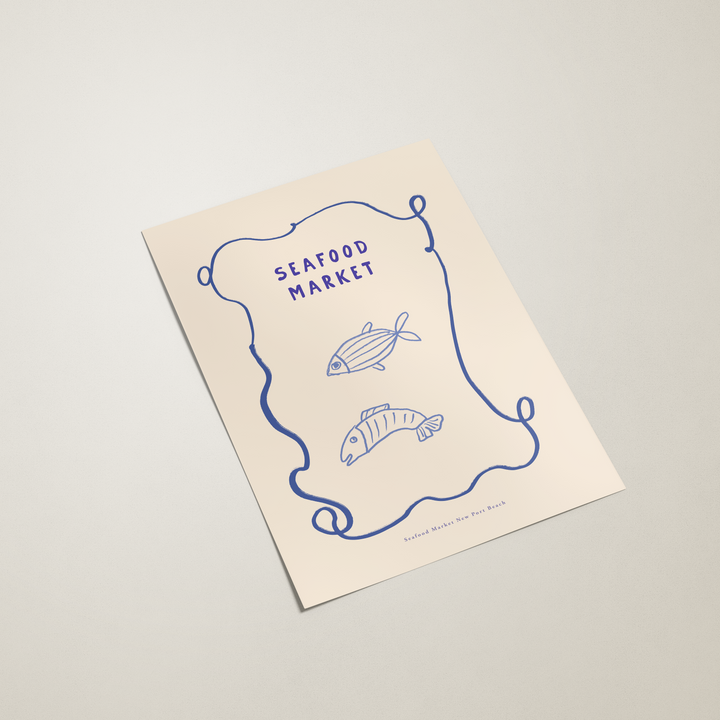 Brochure with 'Seafood Market' text and fish illustrations on a beige background