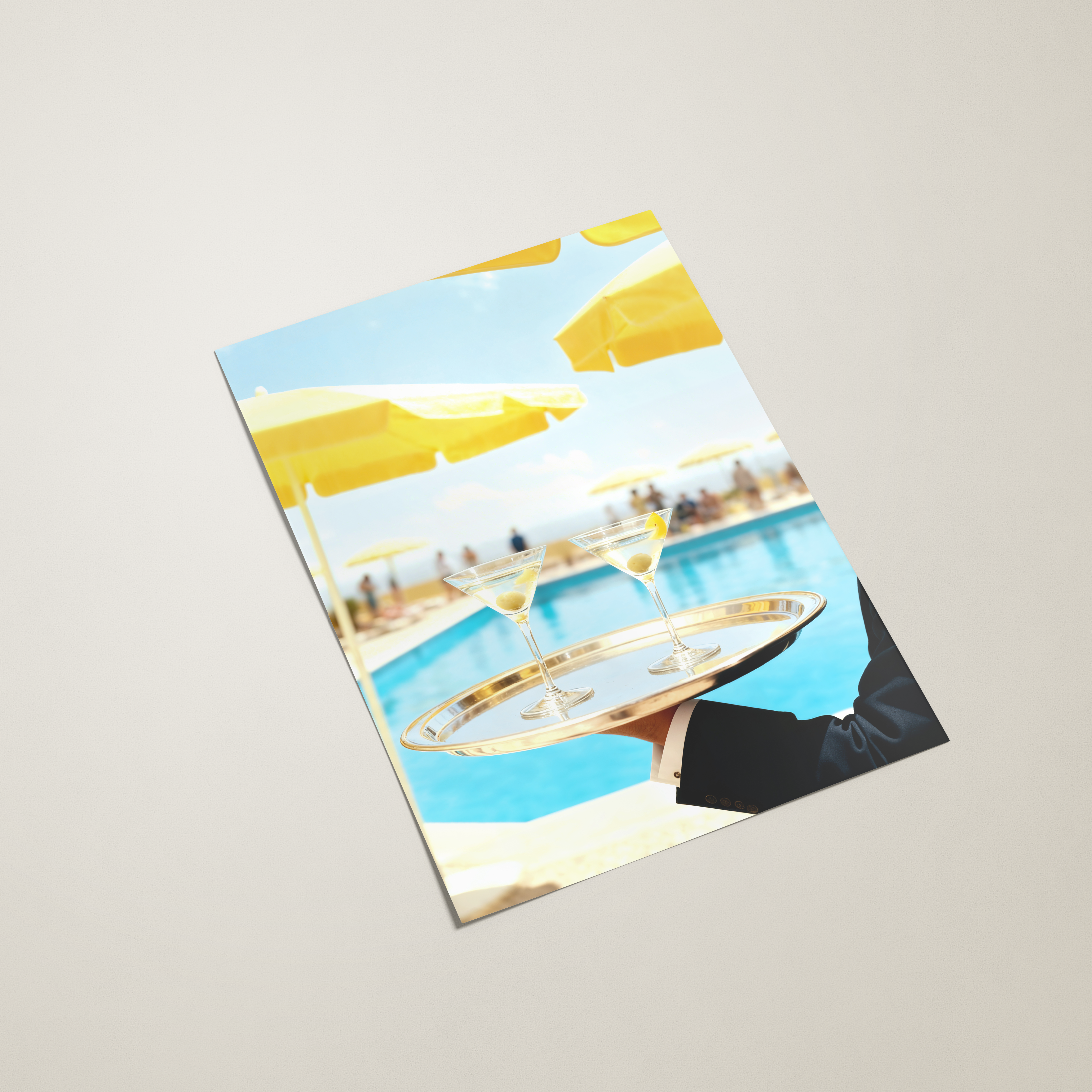 Greeting card with two men in formal attire by a pool on the cover