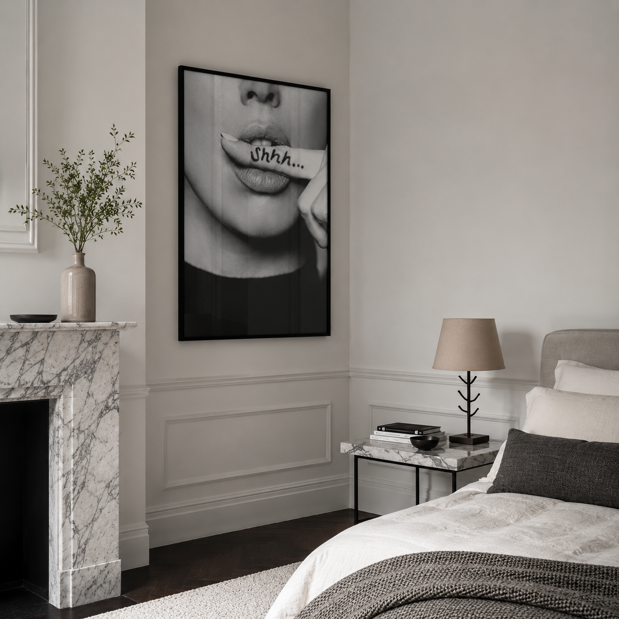 Modern bedroom with marble fireplace, bed, and wall art.