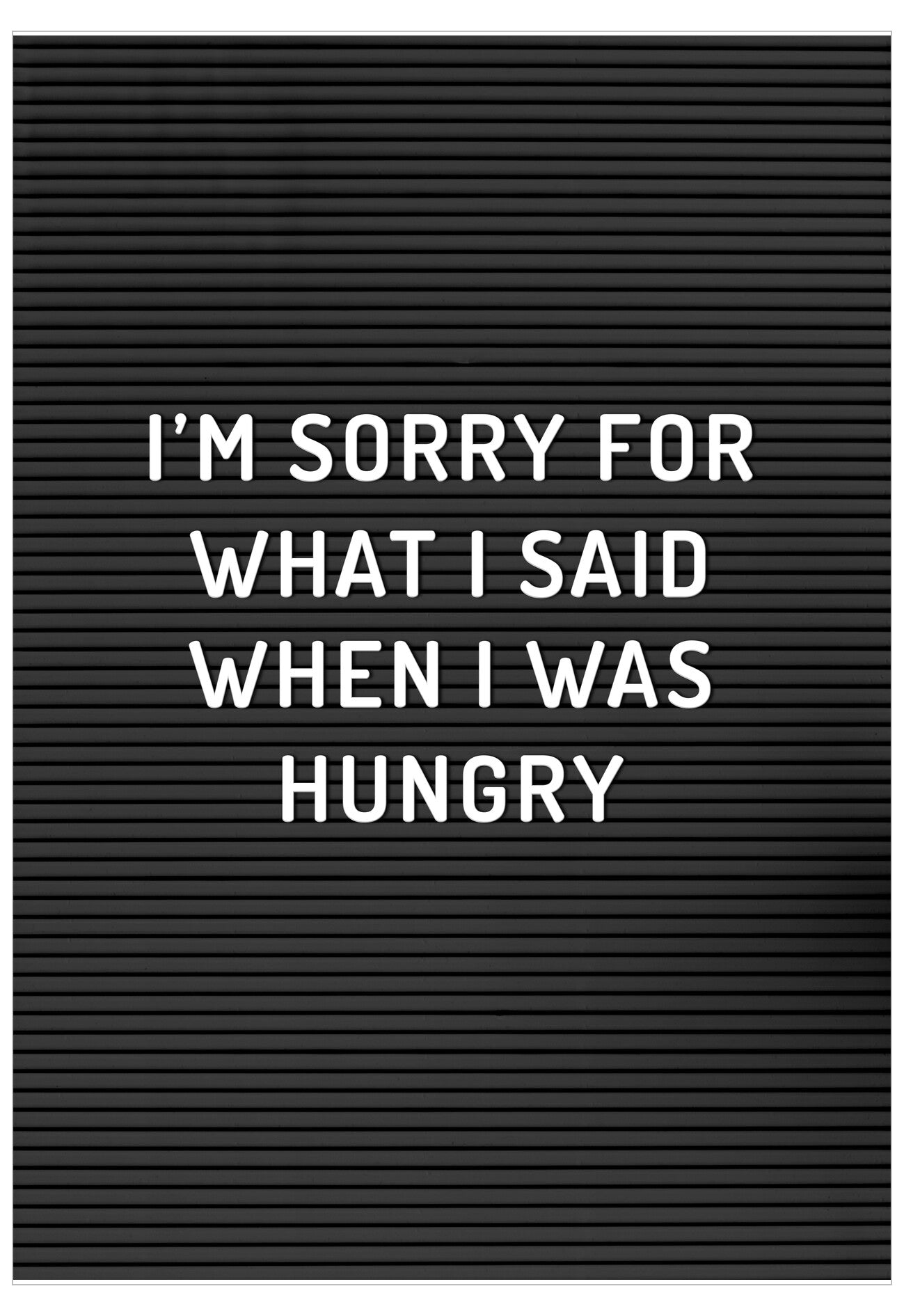 Black letter board with white text 'I'm sorry for what I said when I was hungry' on a black background