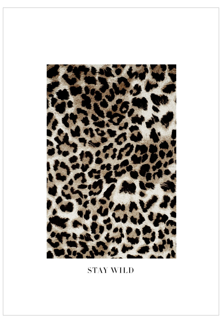 Leopard print pattern with 'Stay Wild' text on a white background