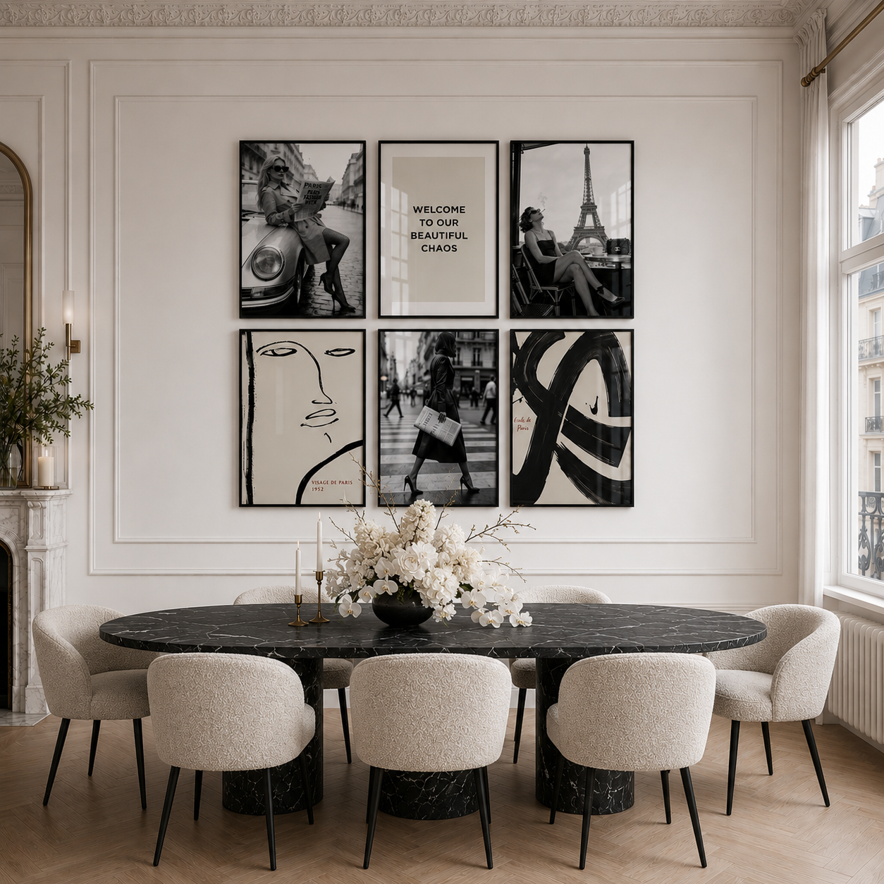 Dining room with a round table and chairs, featuring framed art on the wall.