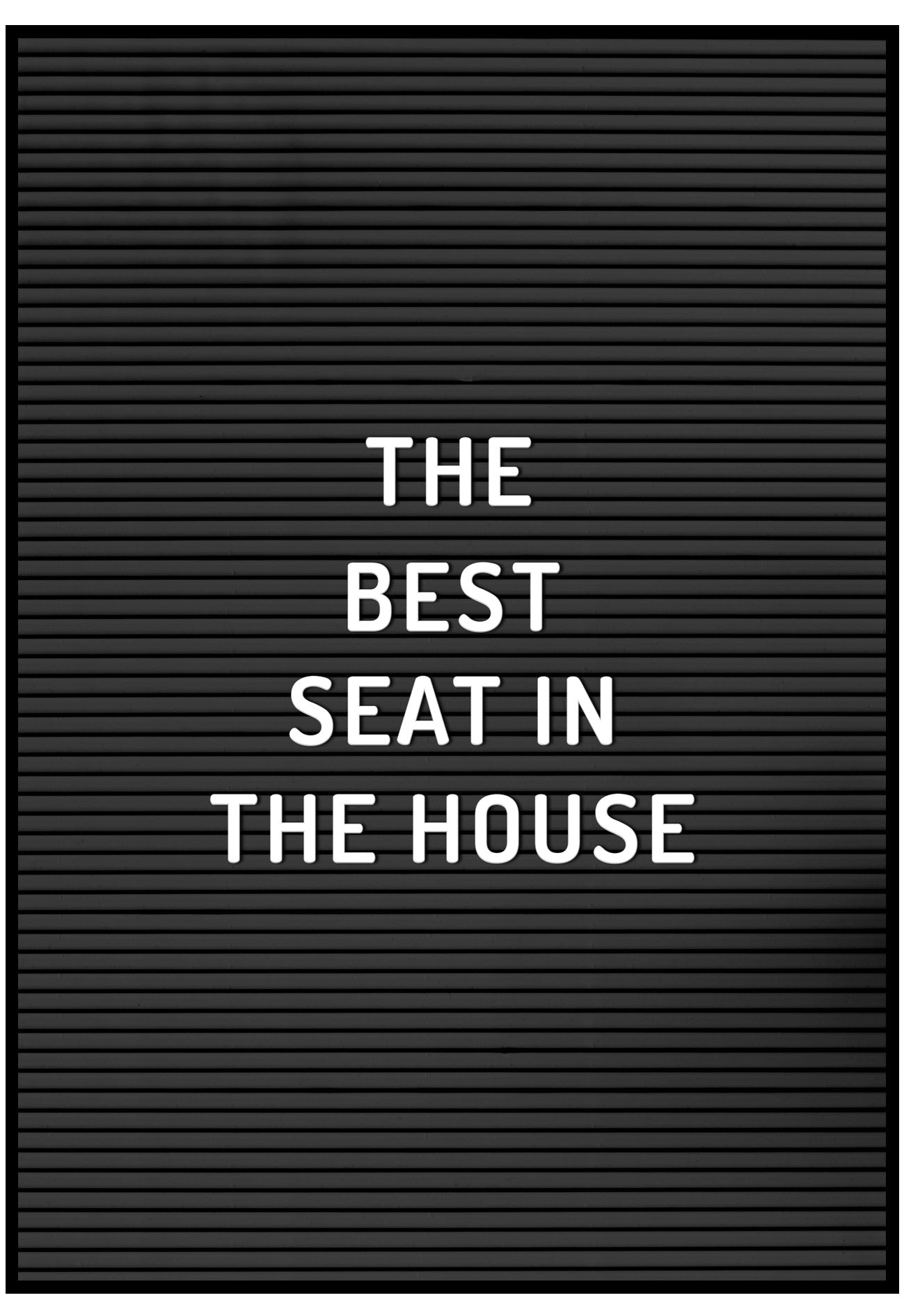 Black letter board with white text 'THE BEST SEAT IN THE HOUSE'