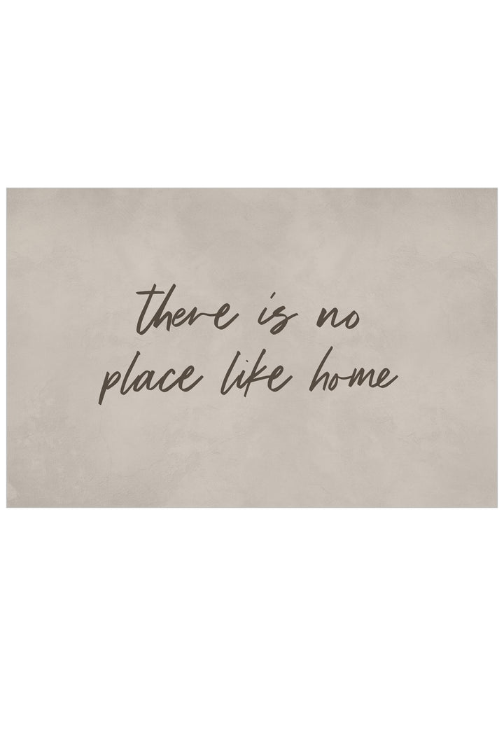 A rectangular wall art print with a textured neutral background and the phrase 'there is no place like home' written in dark taupe colour cursive script, centered on a white background.