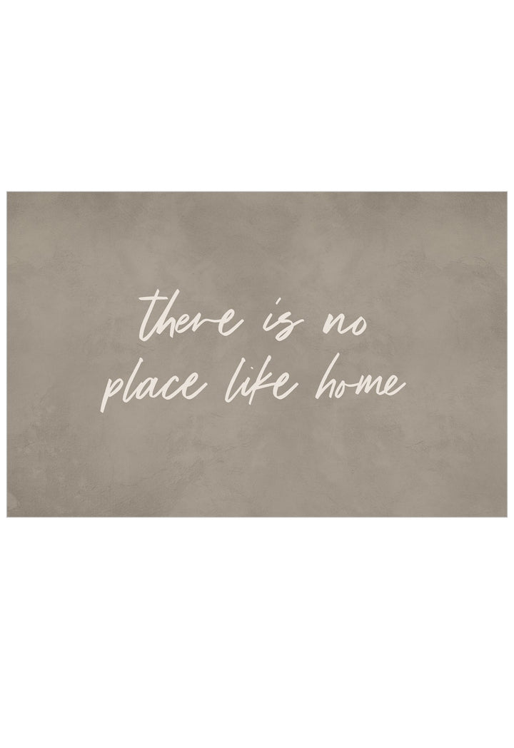 A rectangular wall art print with a textured taupe background and the phrase 'there is no place like home' in white script, centered on a white background.