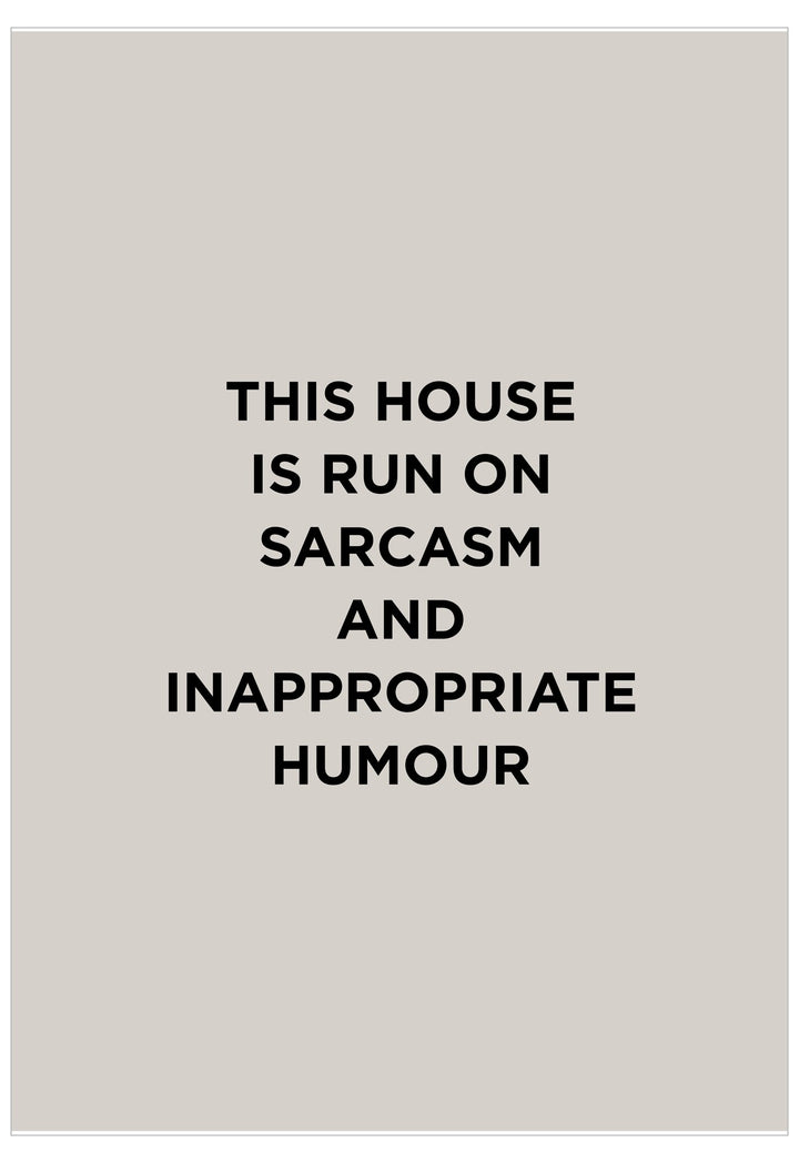 Text on a beige background stating 'This house is run on sarcasm and inappropriate humour'.
