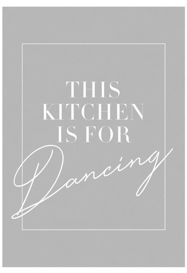Gray poster with white text 'This kitchen is for dancing' on a gray background